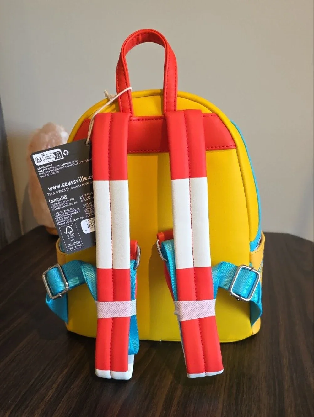 Loungefly Dr. Seuss Yellow Cat in the Hat Mini Backpack with Red & Blue Accents